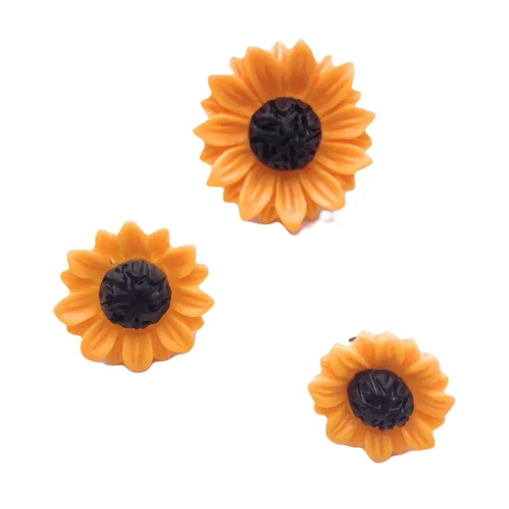 Three sunflower-shaped embellishments.