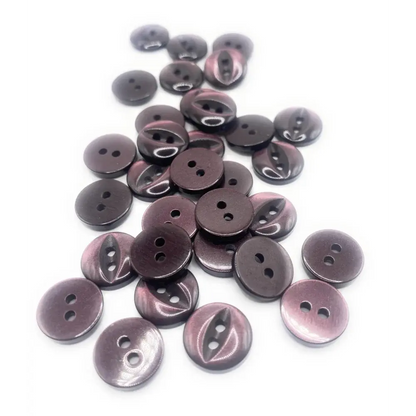 Pile of two-hole brown buttons.