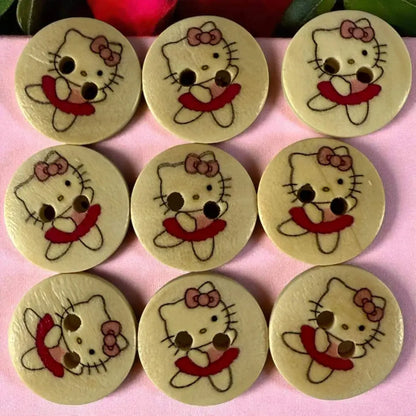 Nine Hello Kitty wooden buttons.