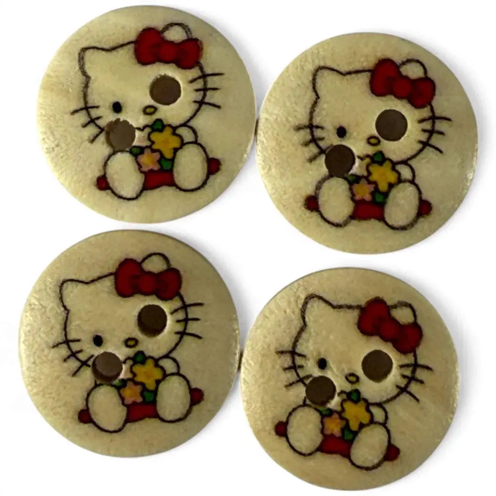 Four Hello Kitty wooden buttons.