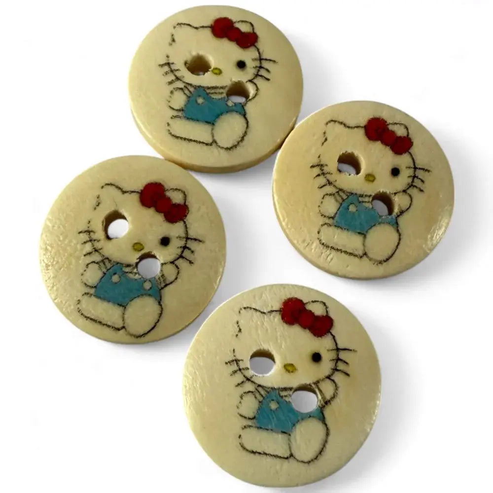 Four Hello Kitty buttons.