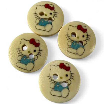 Four Hello Kitty buttons.