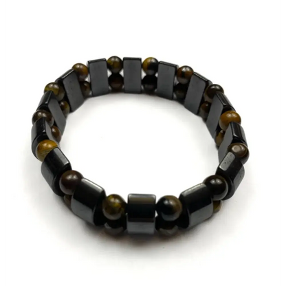 Bracelet with dark rectangular beads and round brown beads.