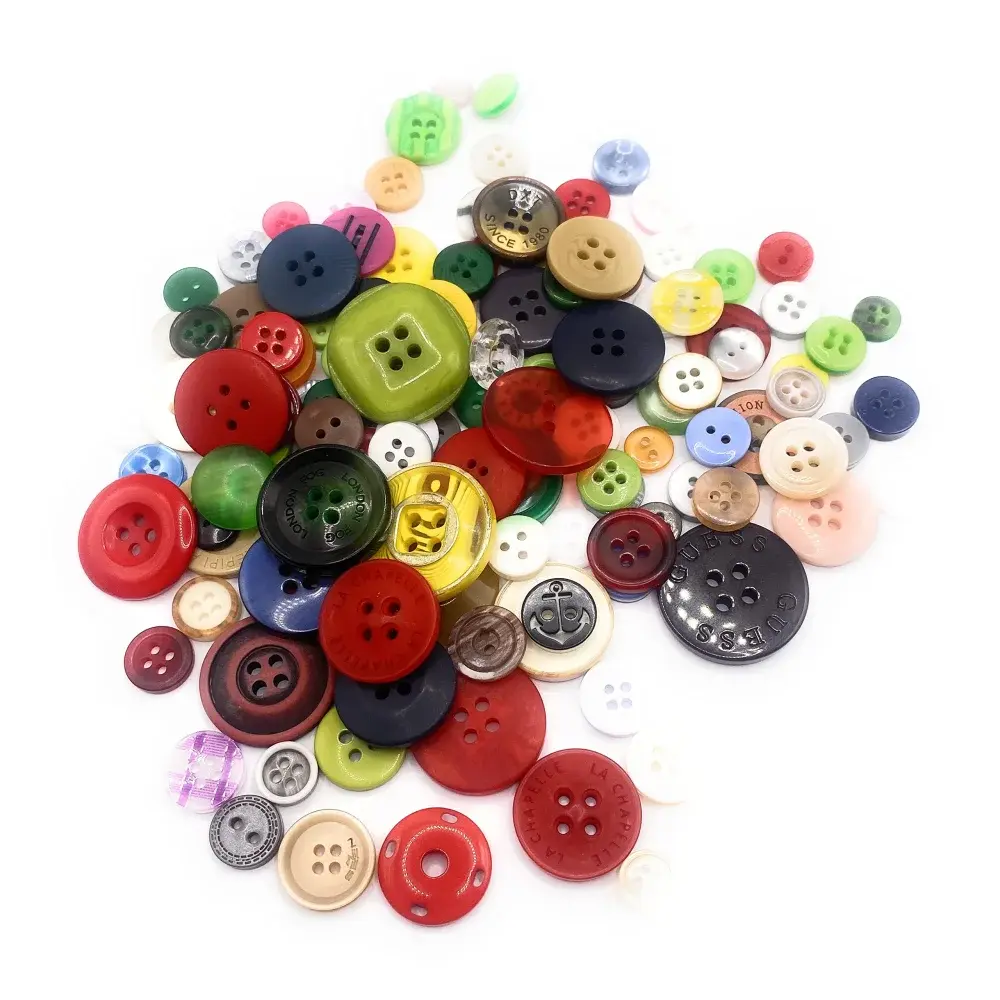 Pile of colorful assorted buttons.