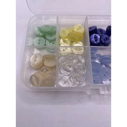 Compartmentalized button collection.