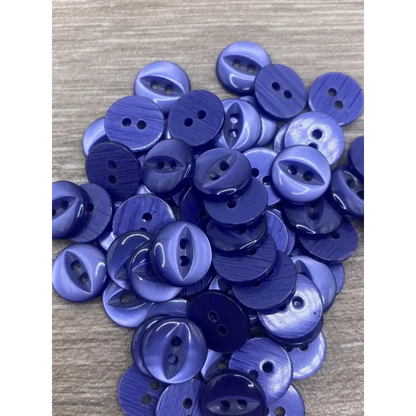 Pile of two-hole purple buttons.