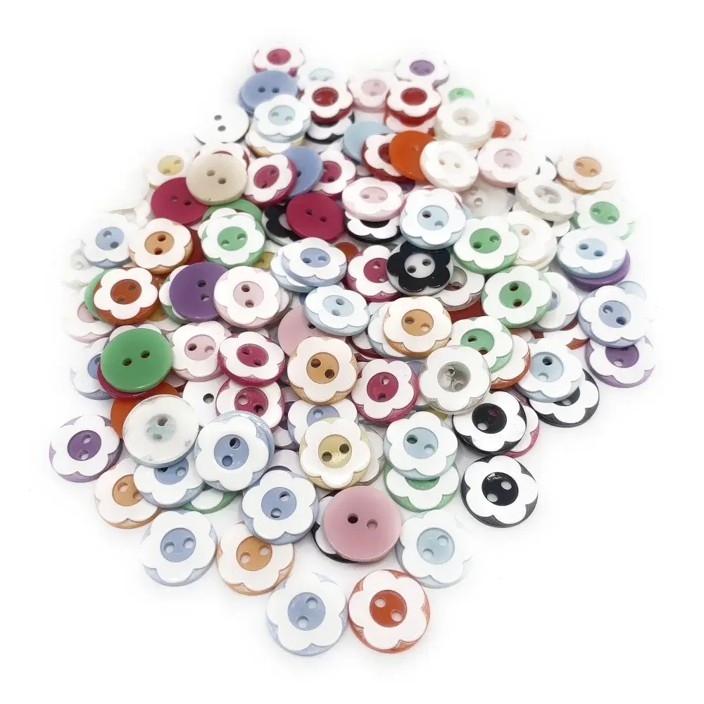 Pile of colorful flower-shaped buttons.