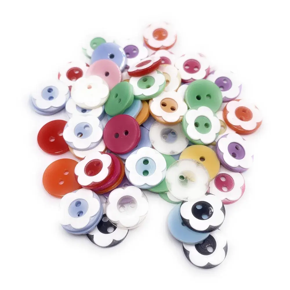 Pile of colorful flower-shaped buttons.