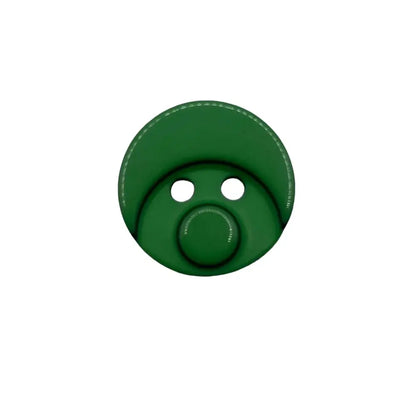 Green pacifier with button.