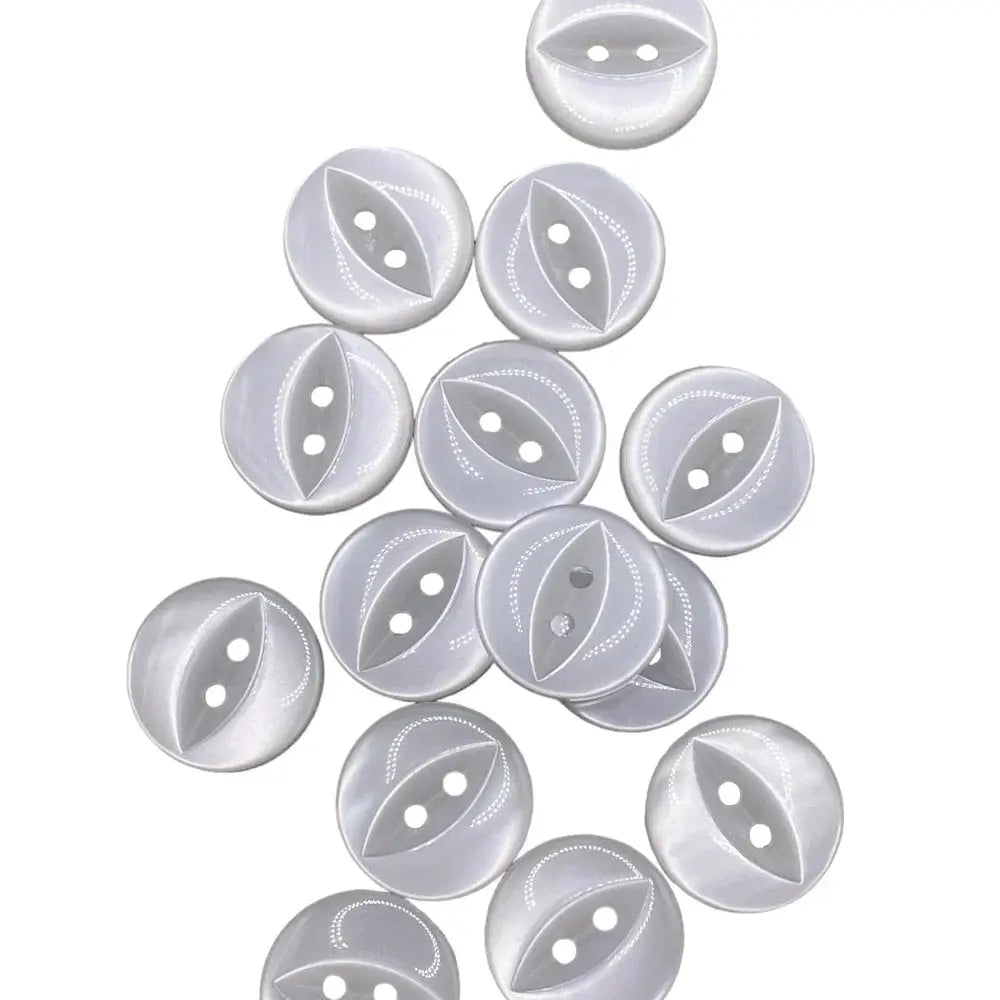 Pile of white, round, two-hole buttons.