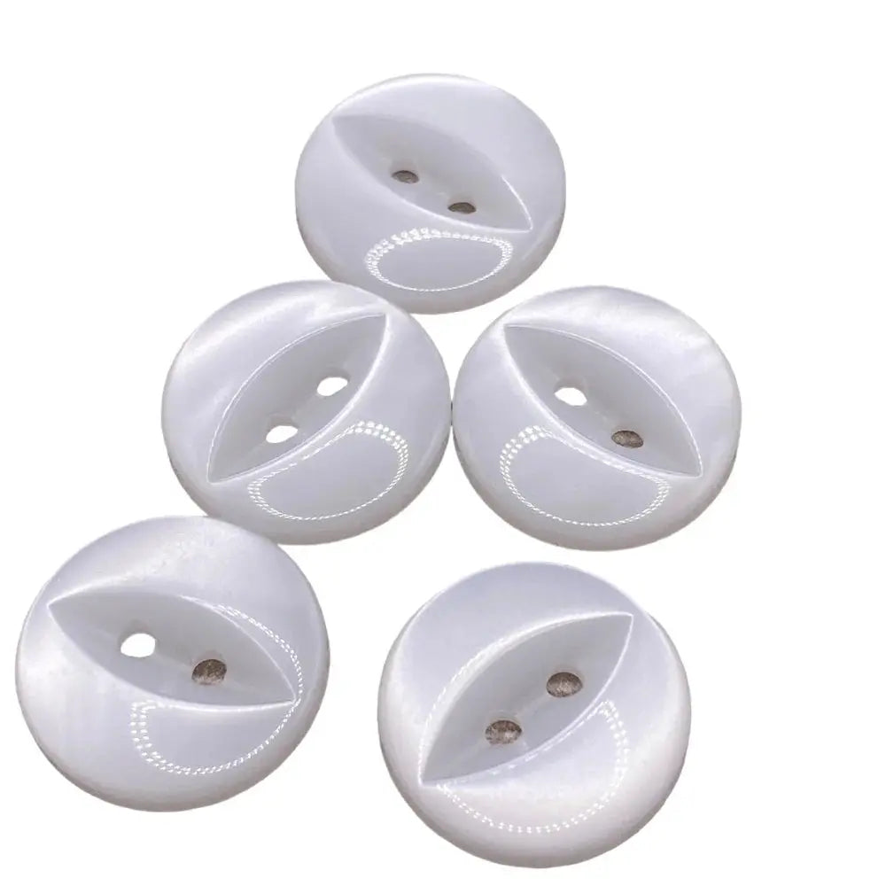 Five white, round, two-hole buttons.