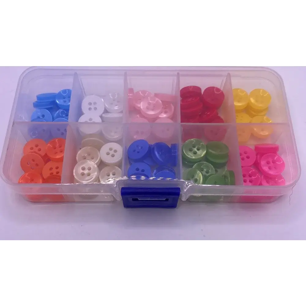 Compartmentalized box of colorful buttons.
