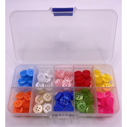 Colorful buttons in a divided container.