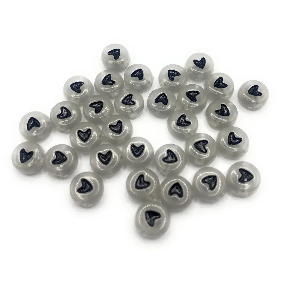 Translucent round beads with heart-shaped accents.
