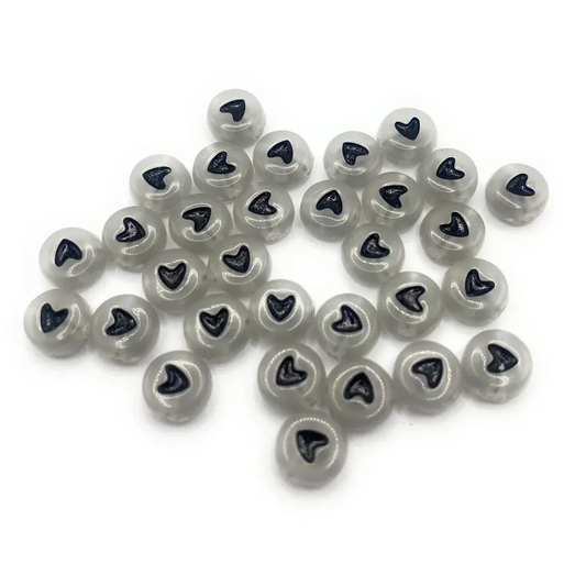 Translucent round beads with heart-shaped accents.
