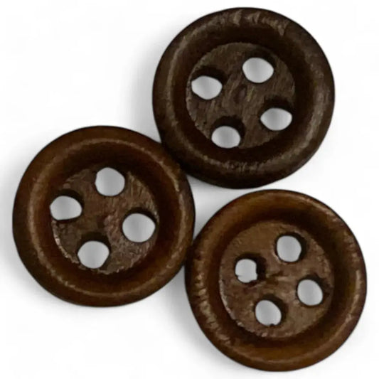 Three brown, four-hole buttons.