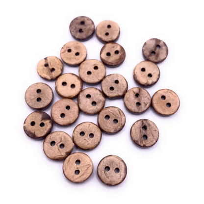 Pile of brown, two-hole buttons.