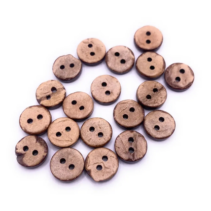 Pile of two-hole coconut buttons.