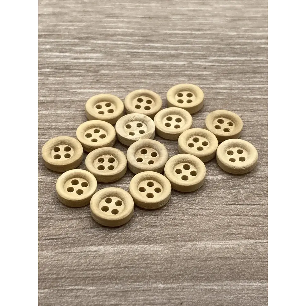 Group of four-hole wooden buttons.