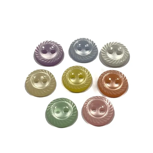 Colorful, two-hole, ridged-edge buttons.