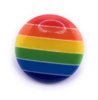 Round rainbow-striped button.