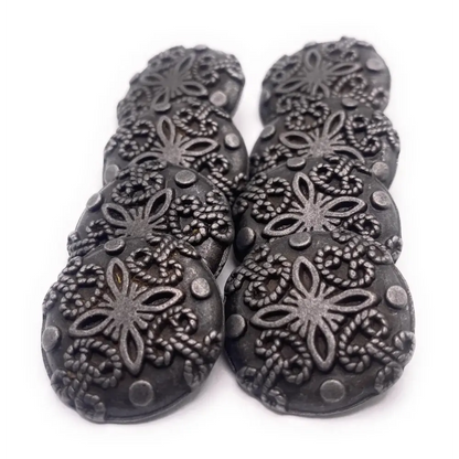 Eight decorative, dark gray buttons.