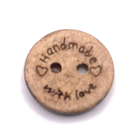 Round wooden button with two holes.