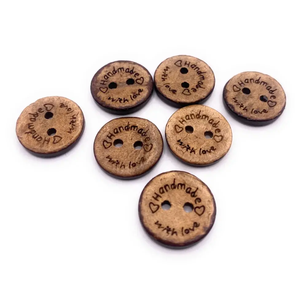 Round wooden buttons with ’Handmade with love’ inscription.