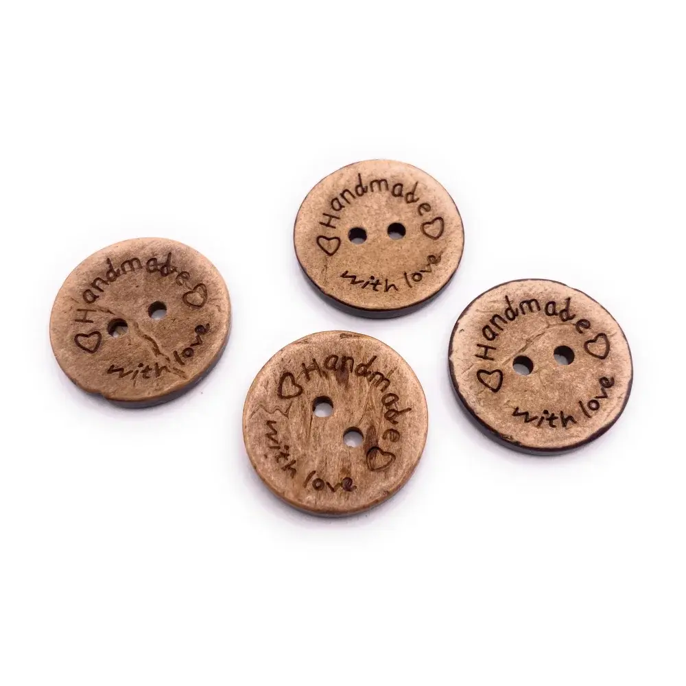 Four wooden ’handmade with love’ buttons.