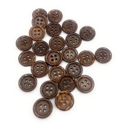 Pile of brown coconut buttons.