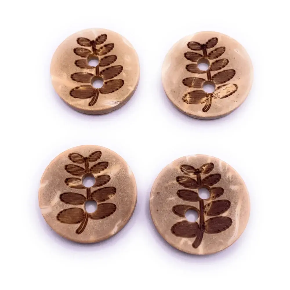 Four brown leaf-patterned buttons.