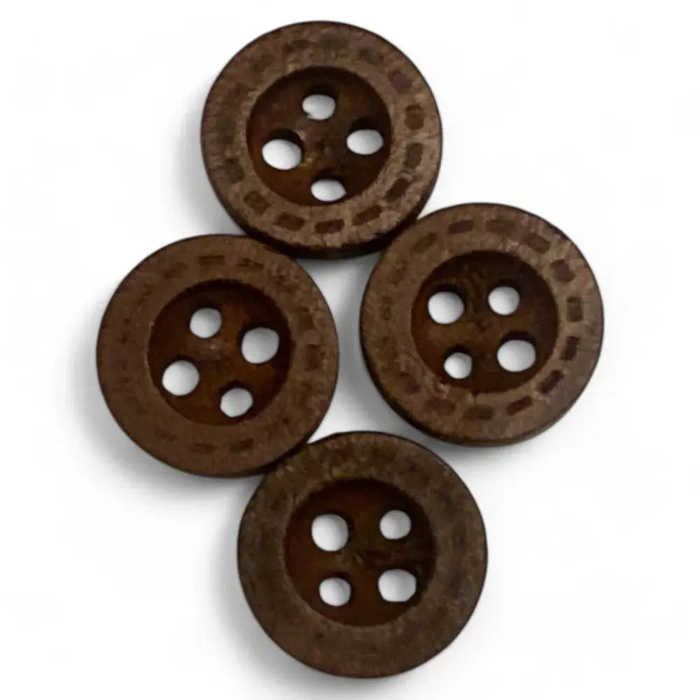 Four brown wooden buttons.