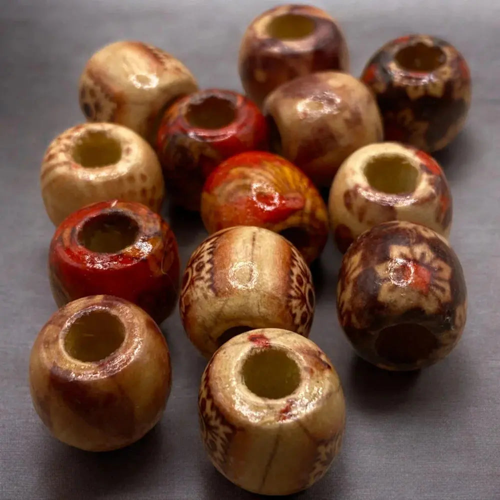 Wooden beads with decorative patterns.