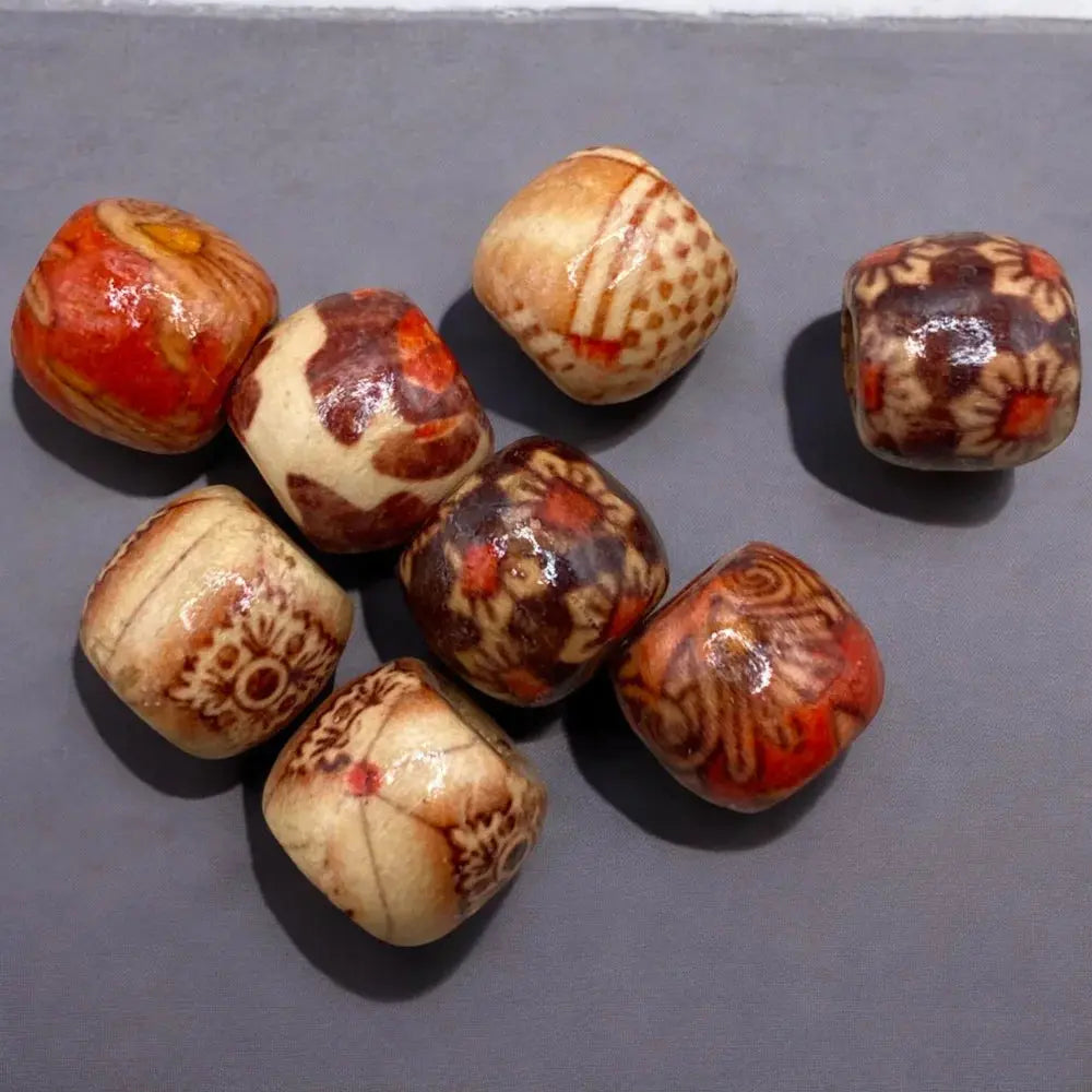 Collection of patterned, cube-shaped beads.