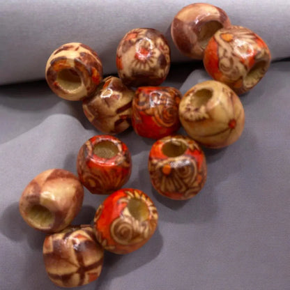 Assorted wooden beads with decorative patterns.