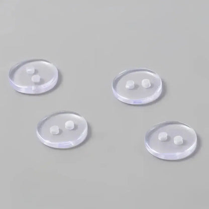 Four clear, two-hole buttons.