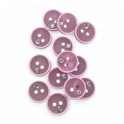Mauve buttons with rhinestones.
