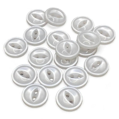 Pile of white, two-hole buttons.