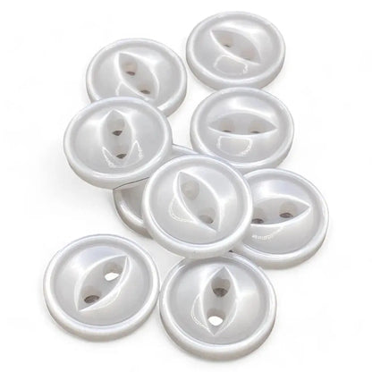 Pile of white, two-hole buttons.