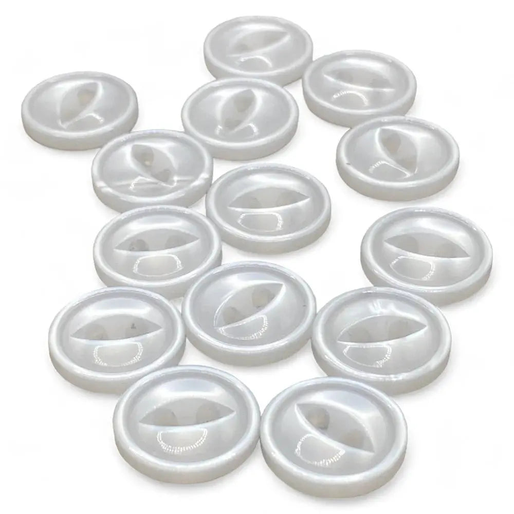 Collection of white, round, concave buttons.