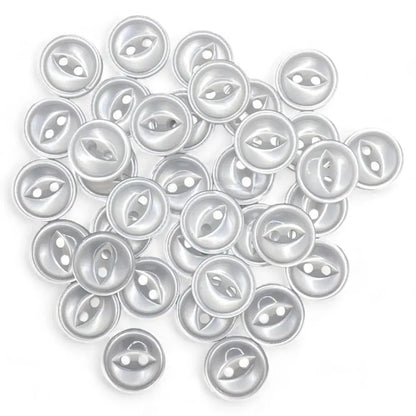 Pile of silver UFO buttons.