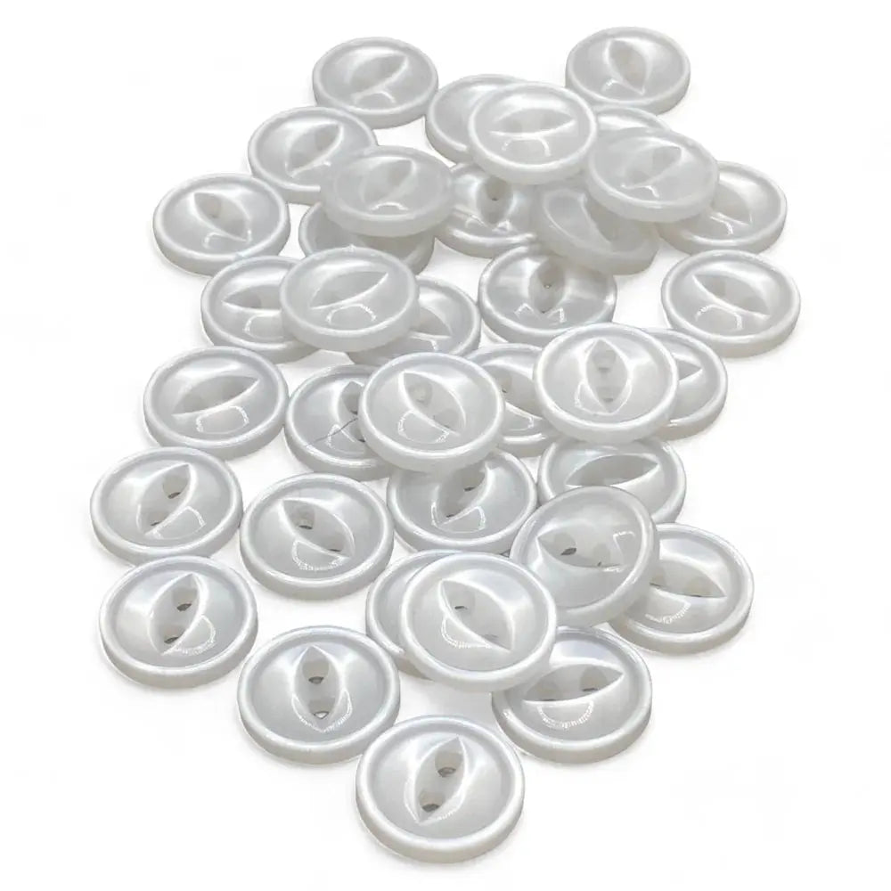 Pile of white, two-hole buttons.