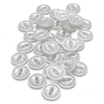 Pile of white, two-hole buttons.