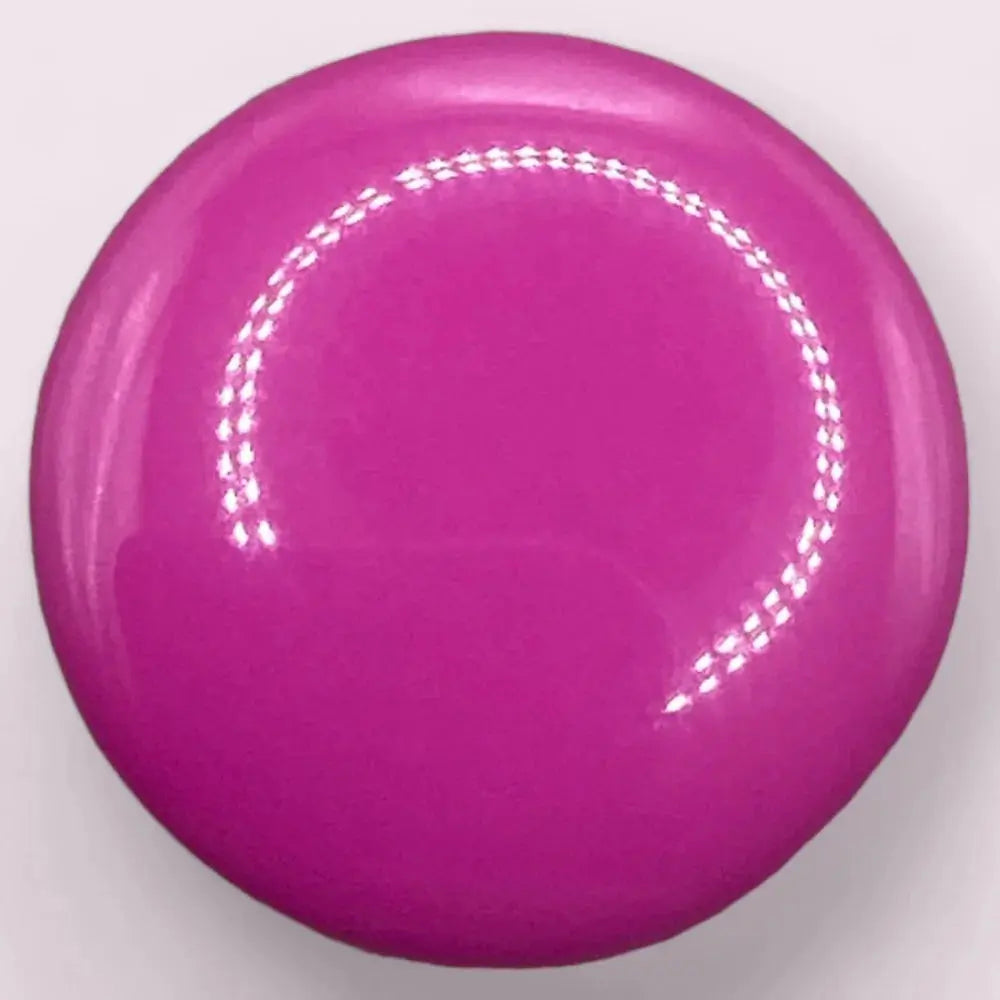 Glossy magenta button.