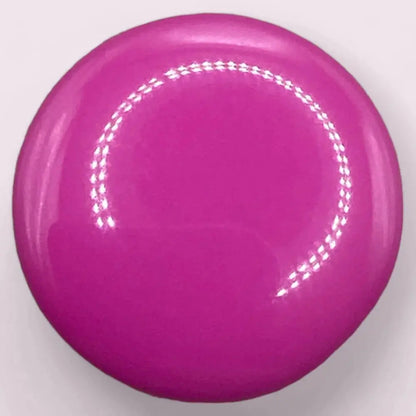 Glossy magenta button.