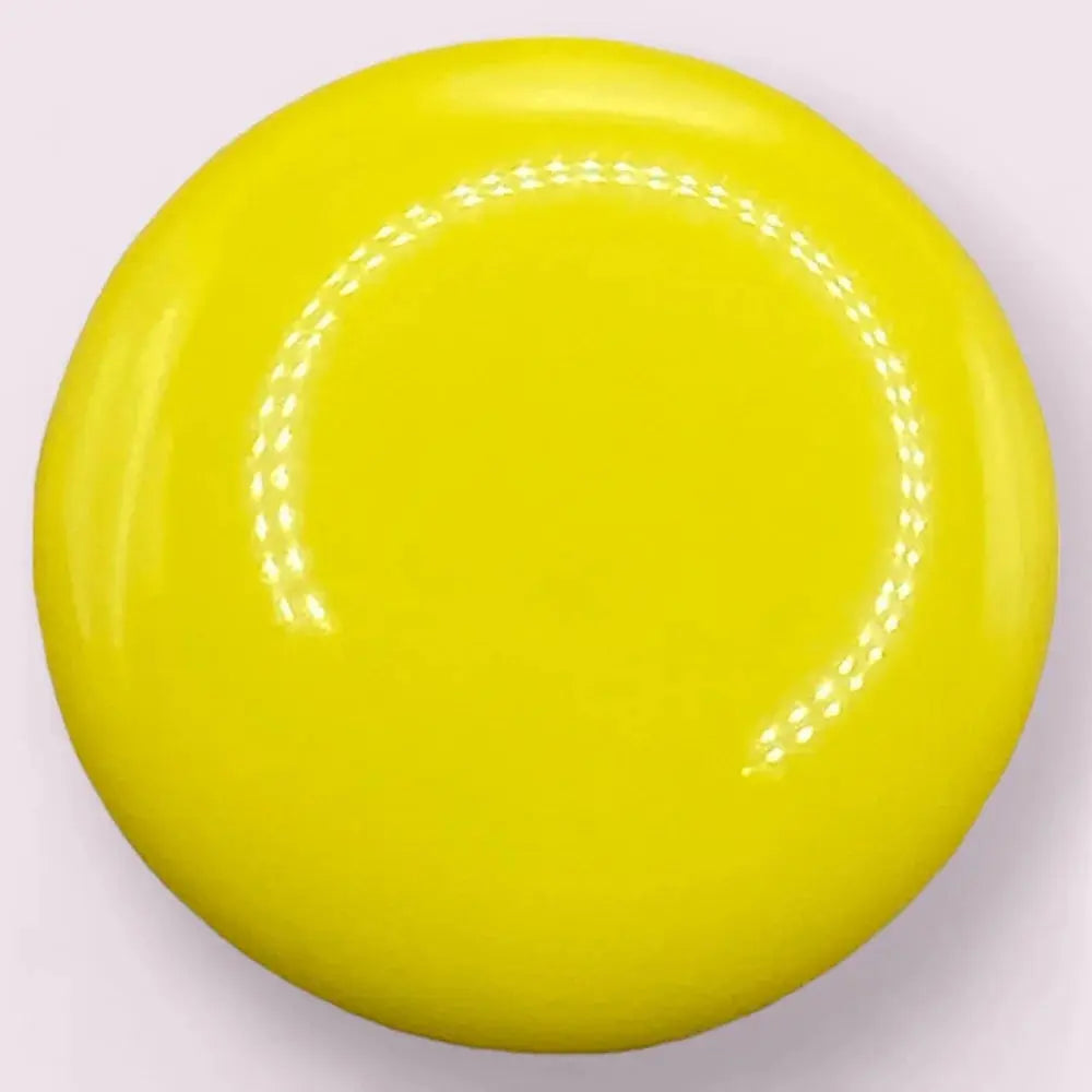 Glossy yellow disc.