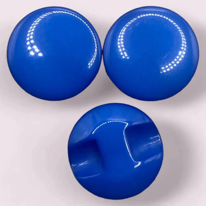 Three shiny blue buttons.