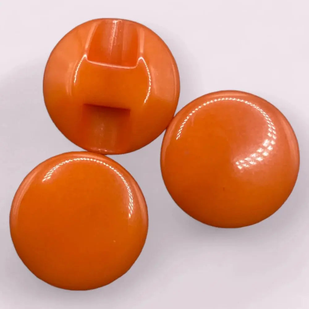 Three orange buttons.