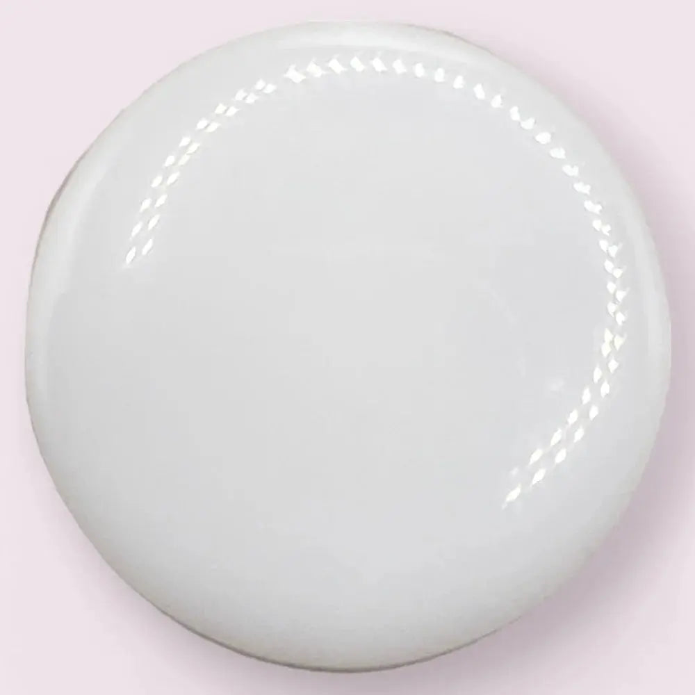 Glossy white circular object.