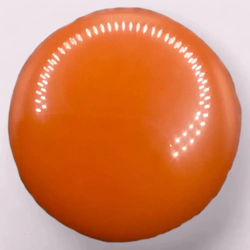 Glossy orange candy.